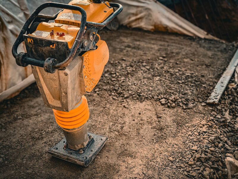 Rammer compactor on a prepared base